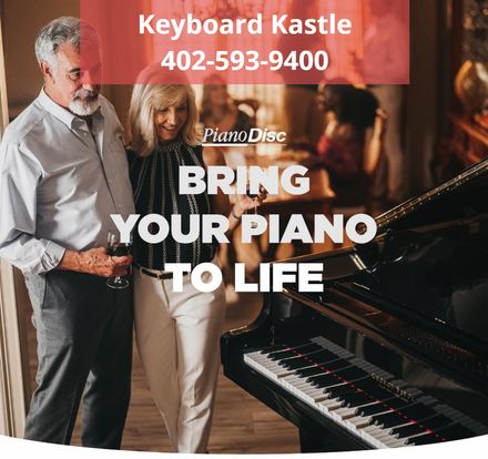 Couple beside a grand piano; text: "Keyboard Kastle 402-593-9400. PianoDisc. Bring your piano to life"